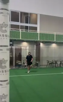 A player on the green court